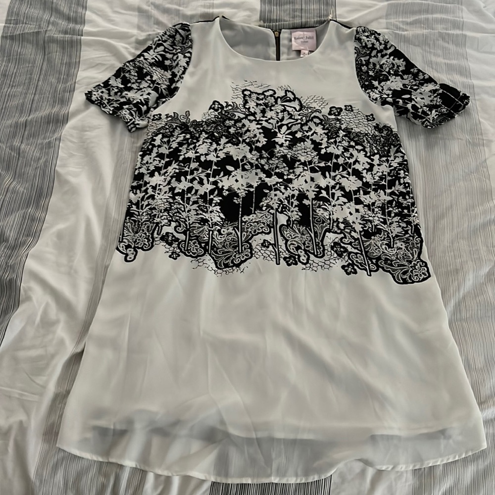Black and white dress. New. Never worn. Tags recent pulled.